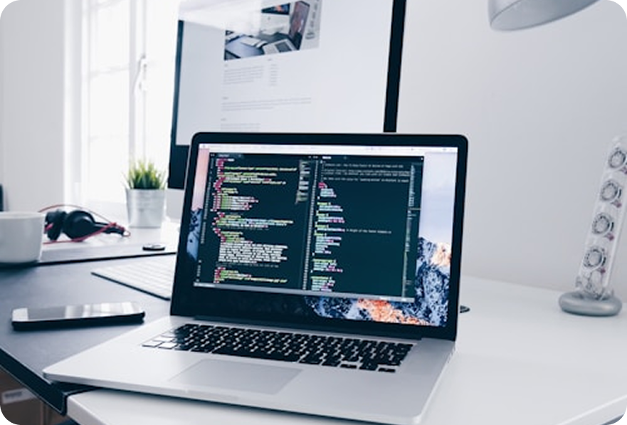 Modern desk setup with laptop and accessories